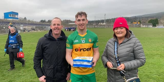 Ronan McDermott who scored the opening goal for Donegal today against Wicklow in his 100th appearance for the County. Seen here with his parents John and Majella. Photo Donegal GAA