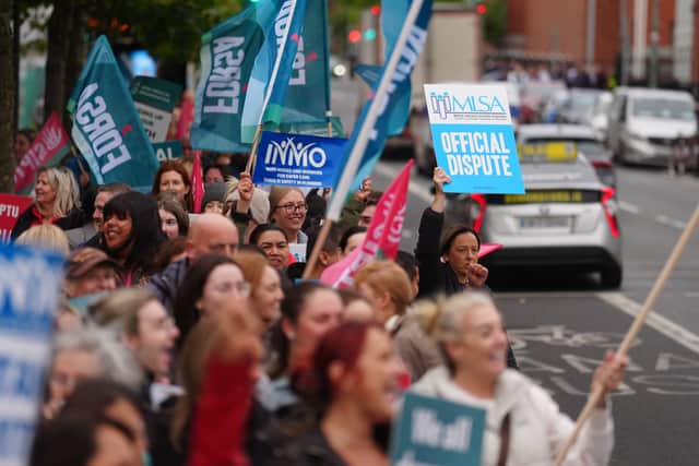 Public sector workers including nurses, doctors, teachers and civil servants, take part in a 24-hour strike over delays in agreeing a new public sector pay deal in, Dublin (Brian Lawless/PA)
