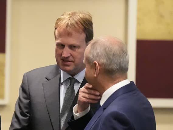 Justice Minister Jim O’Callaghan speaking to Taoiseach and Fianna Fáil leader Micheál Martin