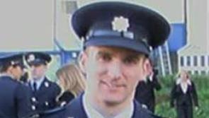 Gardaí pay tribute to Garda Robert McCallion on the anniversary of his death

