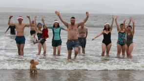 In pictures: Swimmers enjoy festive Christmas Day Swim 2023 at Fahan