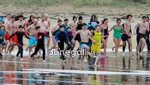 In pictures: Dunree Dip on New Year's Day in memory of Pat Lynch