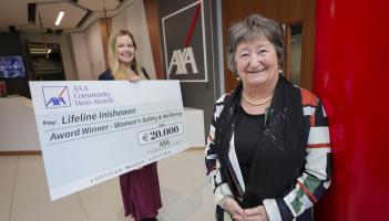 Mary Doherty, right, won a &euro;20,000 prize for Lifeline Inishowen in the women's safety and wellbeing category at the AXA Community Hero awards. She is pictured with Olwen MacMahon, AXA. Photo: Fennells
