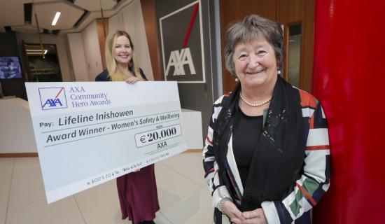Mary Doherty, right, won a &euro;20,000 prize for Lifeline Inishowen in the women's safety and wellbeing category at the AXA Community Hero awards. She is pictured with Olwen MacMahon, AXA. Photo: Fennells