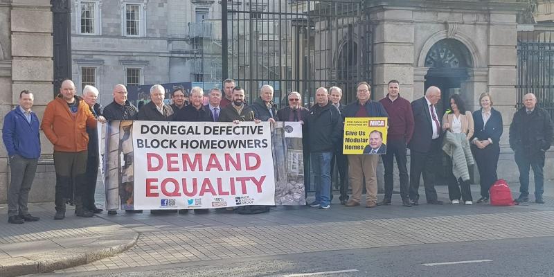 Councillors address Oireachtas members following protest over defective blocks