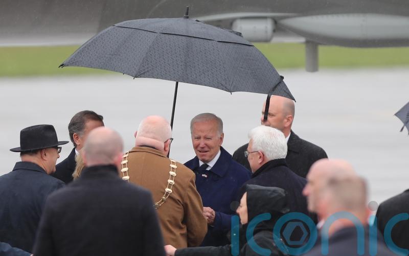 Biden braves wet and windy conditions on arrival at Dublin Airport