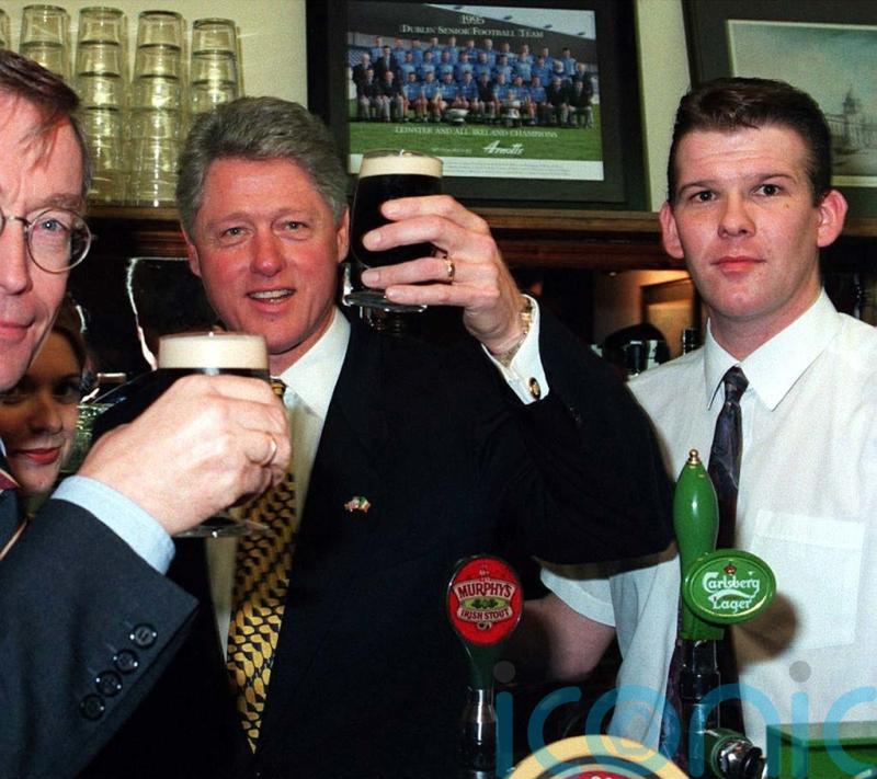 White House did not want photo of Clinton shaking Adams&rsquo; hand during 1995 visit